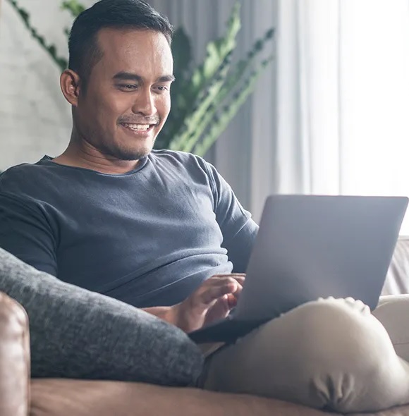 Customer smiling while opening a new account with High Rage Trust